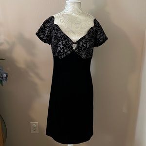 Sequined black velvet cocktail dress.